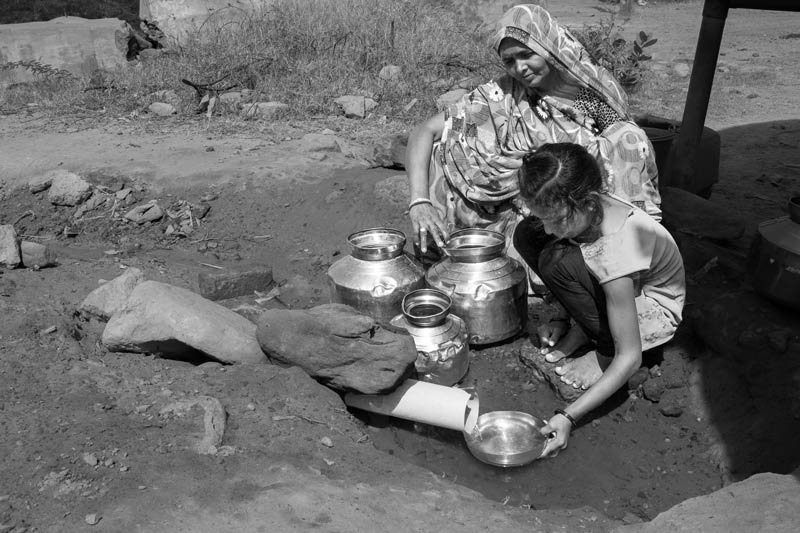 Human Right to Water in Kutch district, Gujarat - Improvised water collection from a pipeline leakage